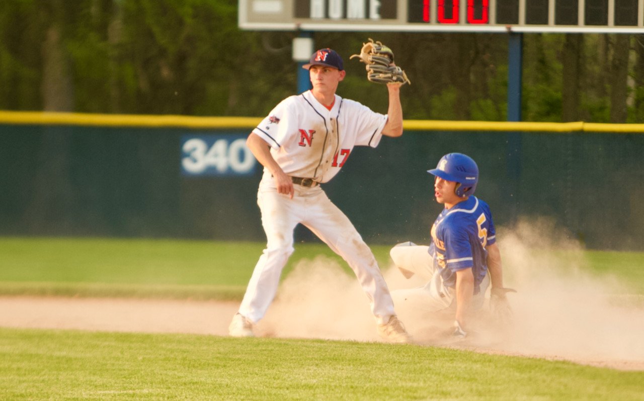 North Montgomery's Jakob Kirsch attempts a tag on Evan Chaney.